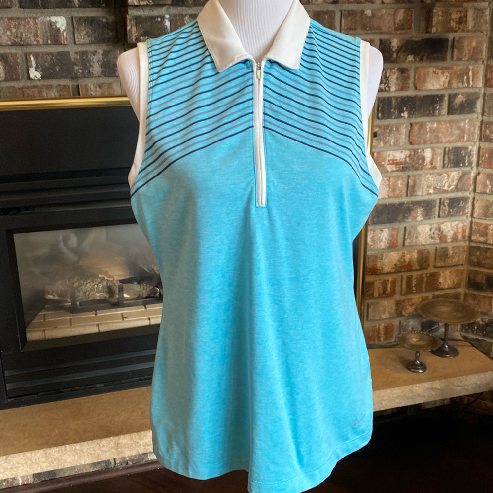 NIKE sleeveless zipper neck golf shirt. Tour performance dri-fit. Size US large.
